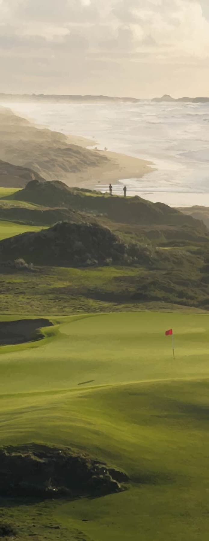 A green above the bluffs, the Pacific beyond