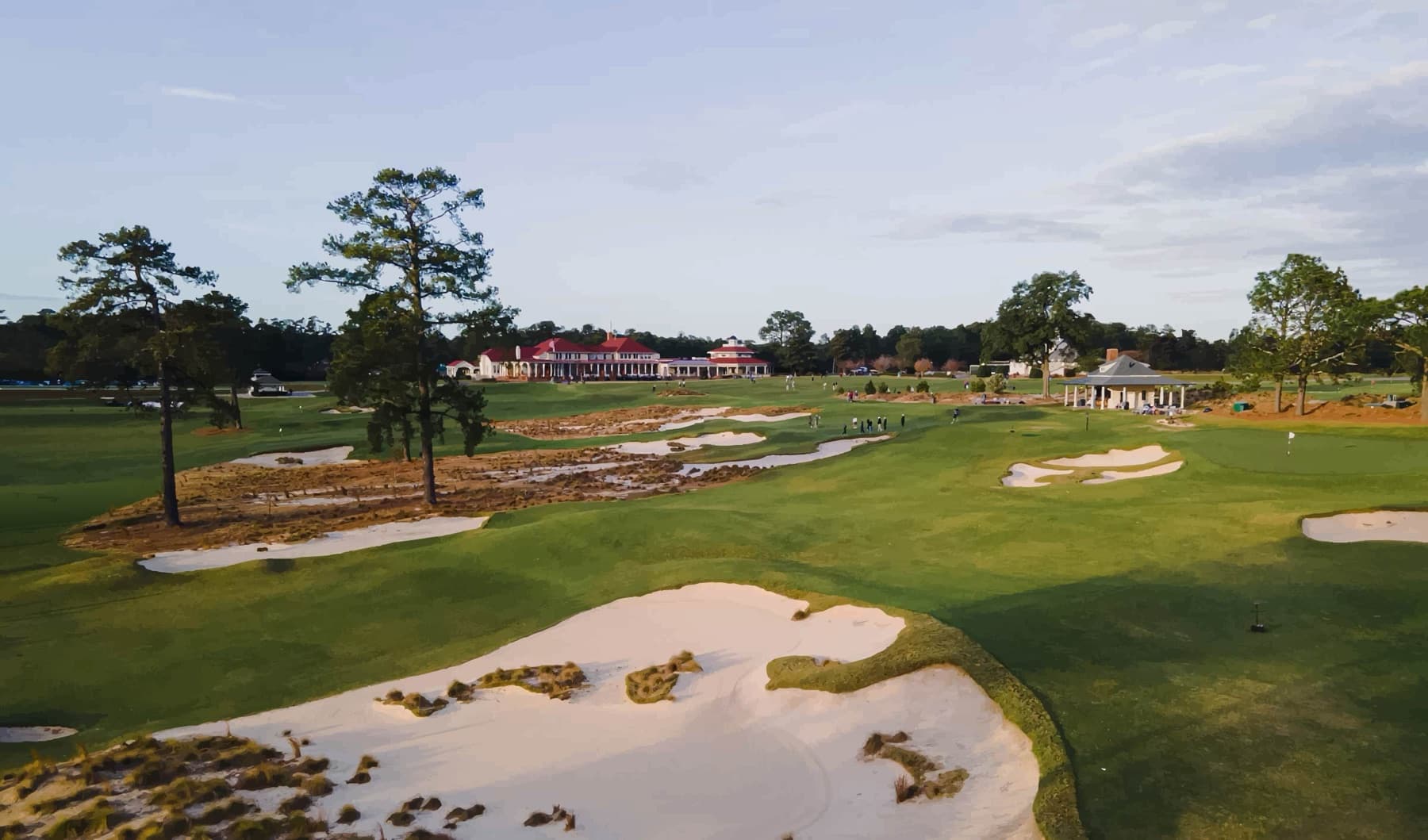 nine short holes spilling from the clubhouse lawn