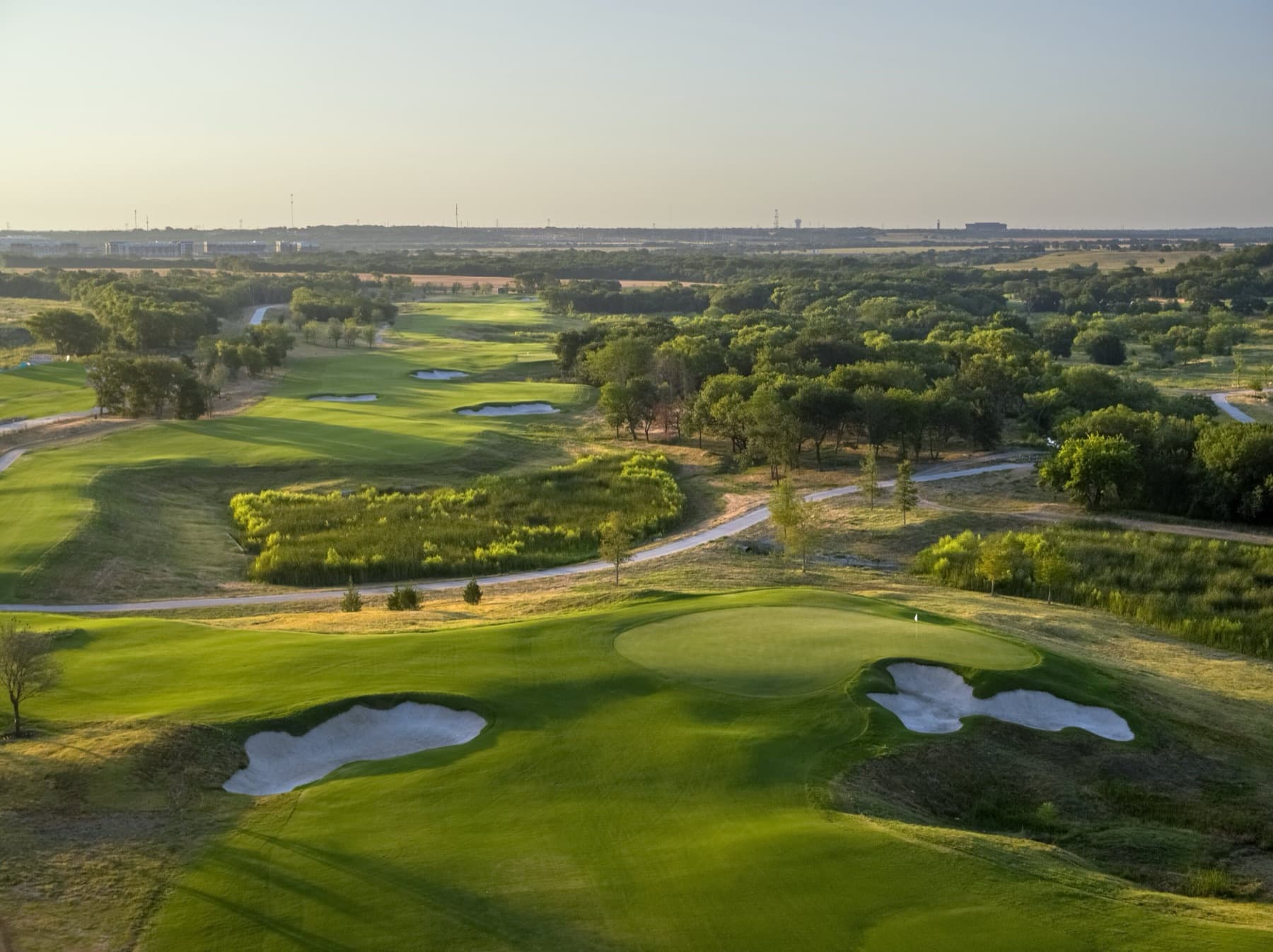 Fields Ranch's blended bunkers above the North Texas prairie